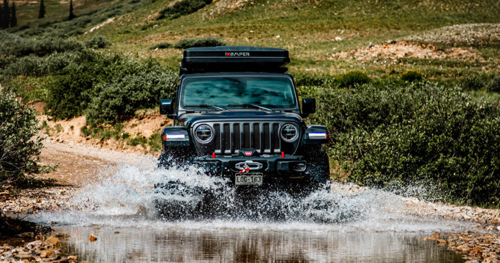 Jeep driving through water